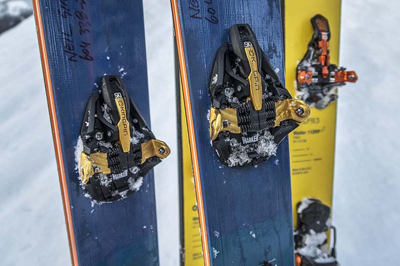A close up of different types of backcountry ski bindings.