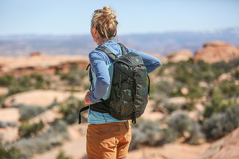 The REI Co-op Flash 22 daypack on a hike in the desert