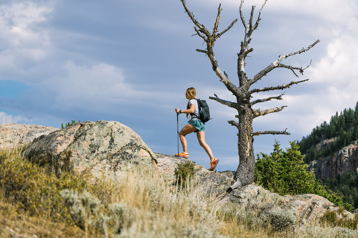 A woman hiking in Hoka Speedgoat 6 in Wyoming