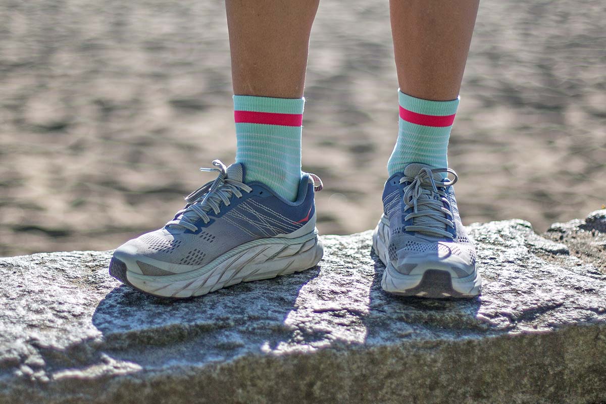 Looking at the side view of a pair of comfortable Hoka shoes