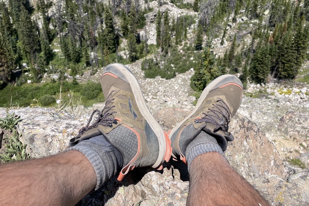 altra lone peak hiker 3 shoes hanging over the edge