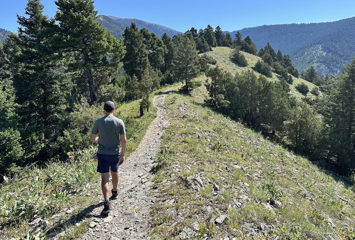 altra lone peak hiker 3 showing a hiker walking along a ridge line