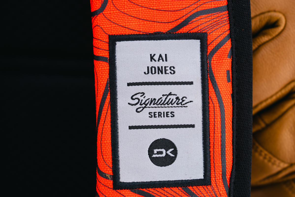 A close up of the tag on a red ski backpack