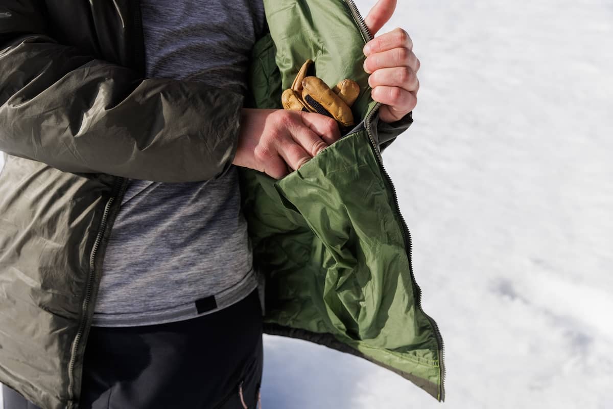 Putting gloves in the internal dump pocket