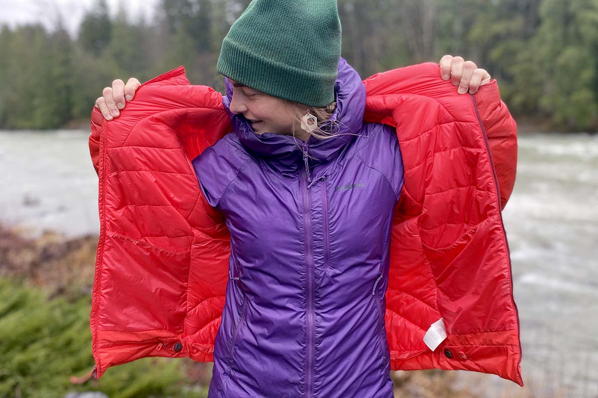 A woman wearing Patagonia DAS Light Hoody and DAS Parka together