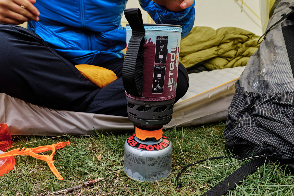 A close up of the Jetboil Flash 1.0 backpacking stove outside of a tent